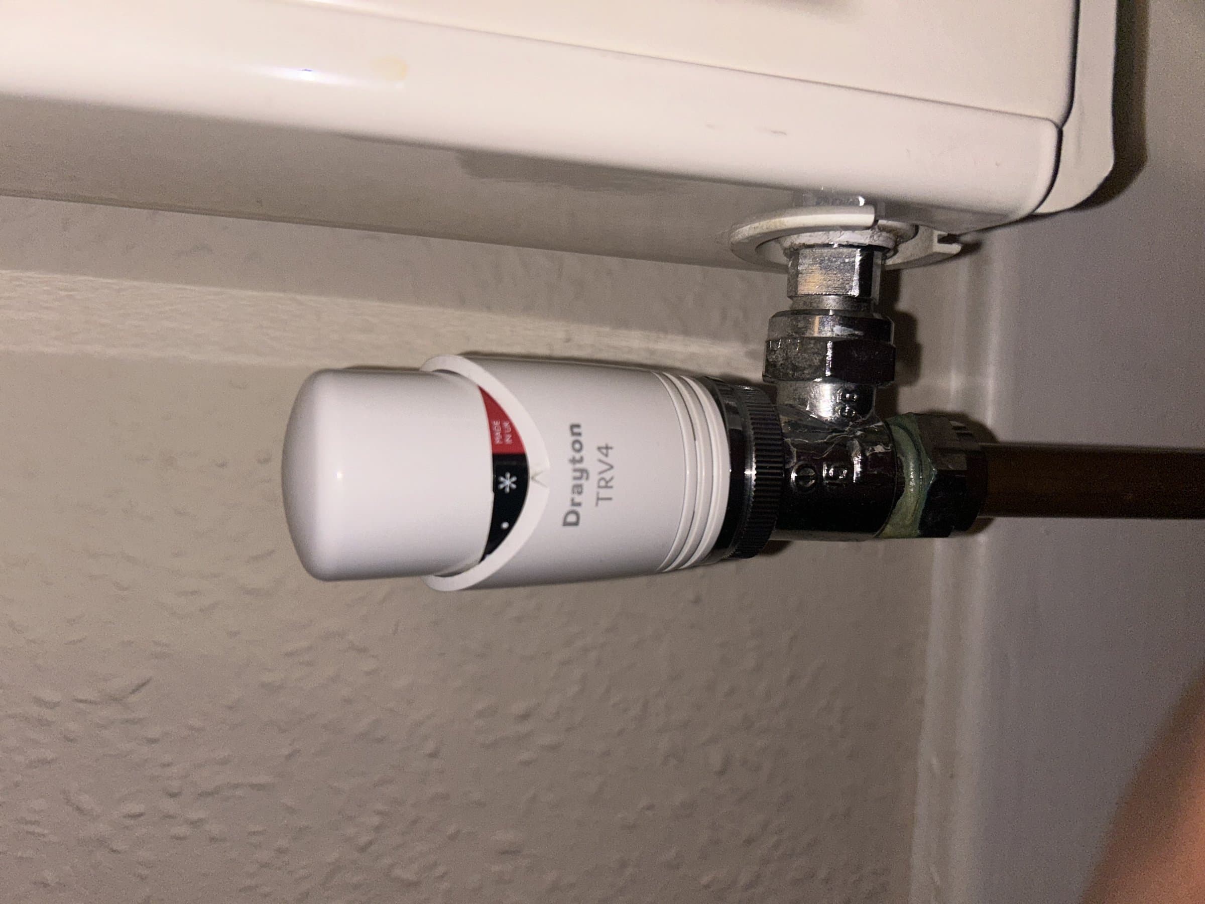 New thermostatic radiator valve fitted to the radiator pipe connection